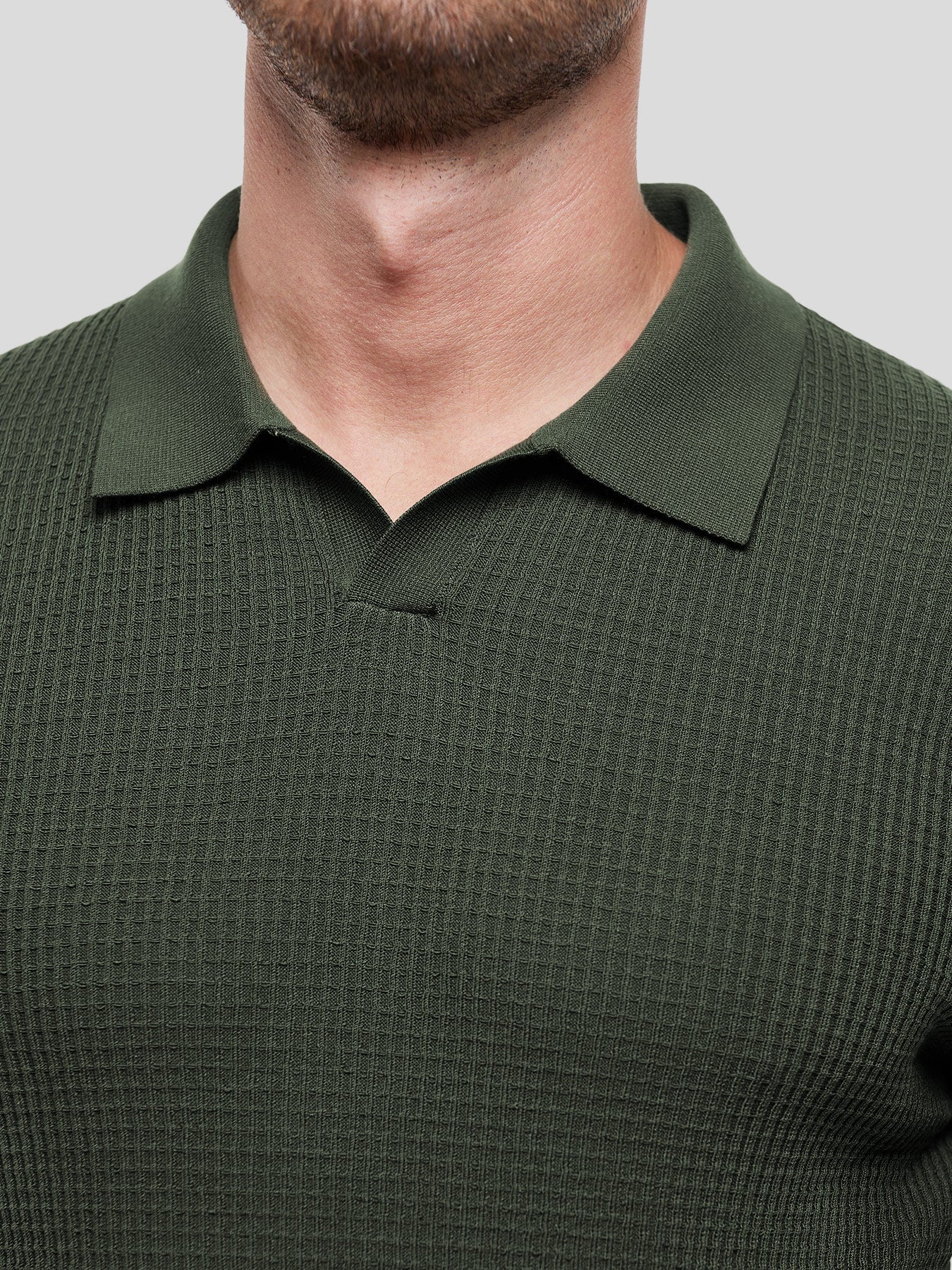 FlexKnit Active Knitted Buttonless Polo